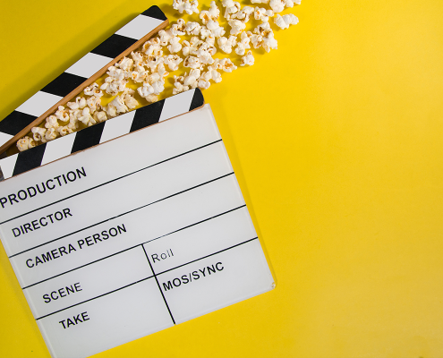 Film Director's Clapboard with Popcorn